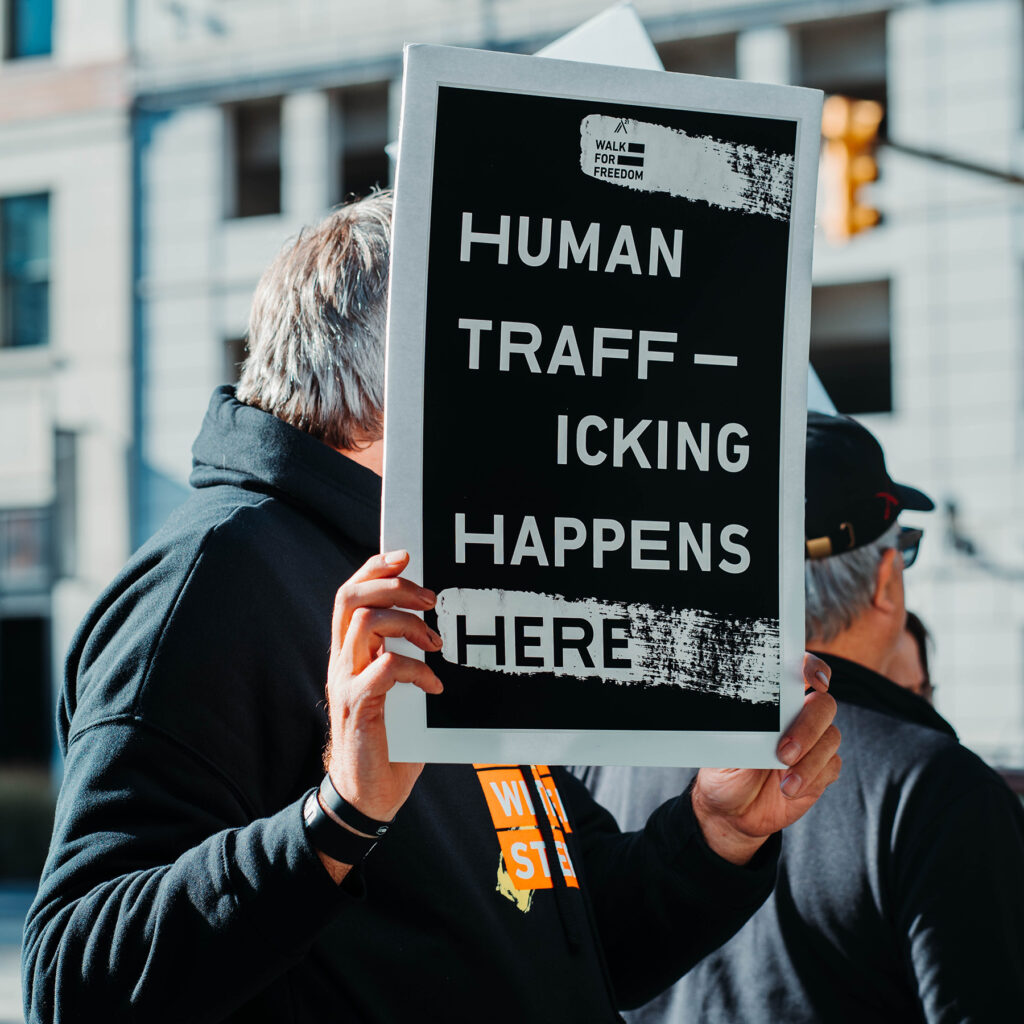 Sign Saying HUMAN TRAFFICKING HAPPENS HERE